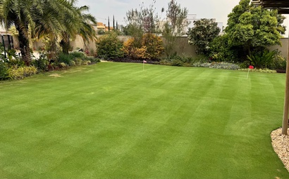 Casa com mini campo de golf Quintal de casa com mini campo de golf